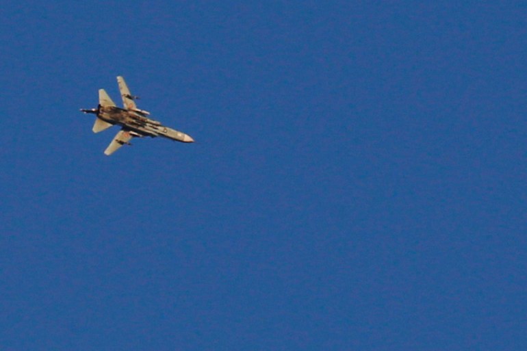 A war jet flies above Syria near the Israeli Syrian border as it is seen from the Israeli-occupied Golan Heights on July 23, 2018 [File: Ronen Zvulun/Reuters]