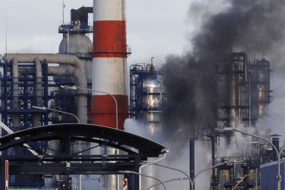 Smoke billows from a fire at oil refinery, owned by Russian oil producer Gazprom Neft, in Moscow, Russia