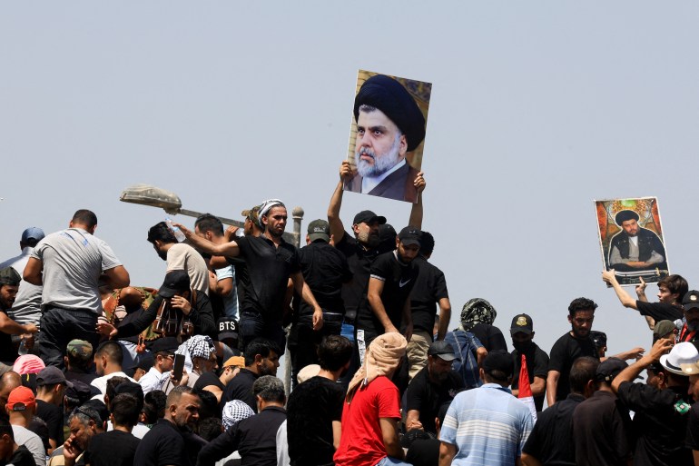 FILE PHOTO: Supporters of Iraqi Shi'ite cleric Moqtada al-Sadr protest against corruption, in Baghdad, Iraq July 30, 2022.