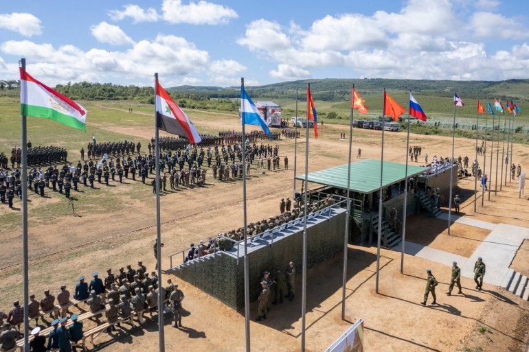 Participants attend the opening ceremony of the Vostok 2022 military exercises at the firing range in the extreme eastern Primorsky region, Russia, August 31, 2022. Russian Ministry of Defense / Handout via Reuters Attention Editors - This photo is provided by a third party.  There are no reviews.  not archive.  compulsory credit