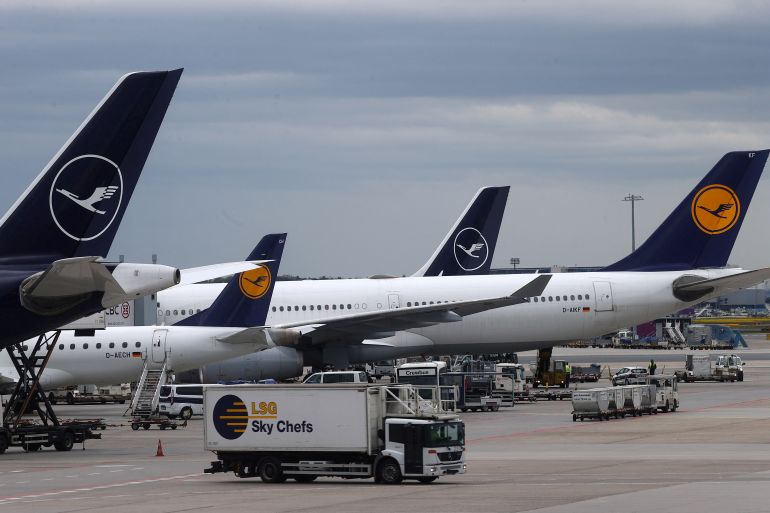 Lufthansa planes in an airport