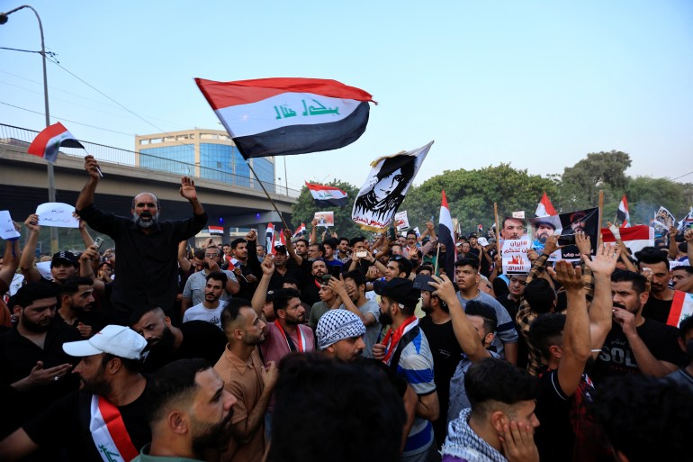 Iraqi demonstrators gather during an anti-government protest in Baghdad.