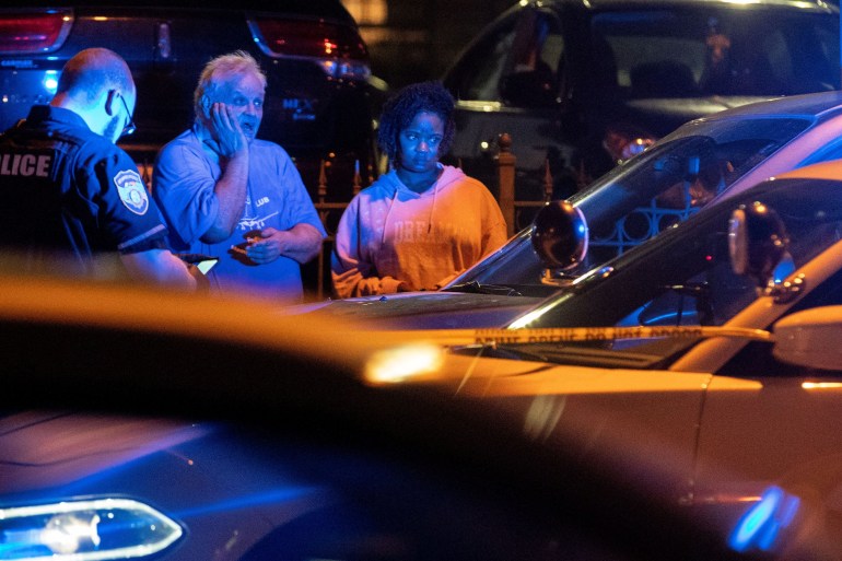 Memphis police officers work at one of multiple crime scenes they believe were committed by a man driving around shooting in Memphis, Tennessee, U.S. September 7, 2022. Christine Tannous/USA Today Network via REUTERS NO RESALES. NO ARCHIVES. MANDATORY CREDIT