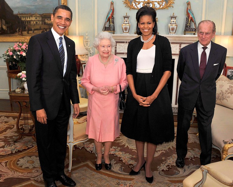 Barack and Michelle Obama standing with the Queen and Prince Philip at Buckingham Palace in 2009