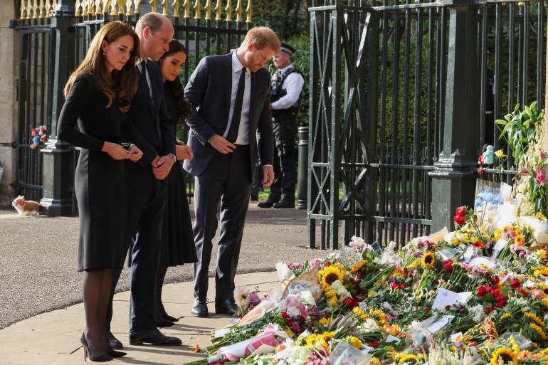 royals inspect floral tributes