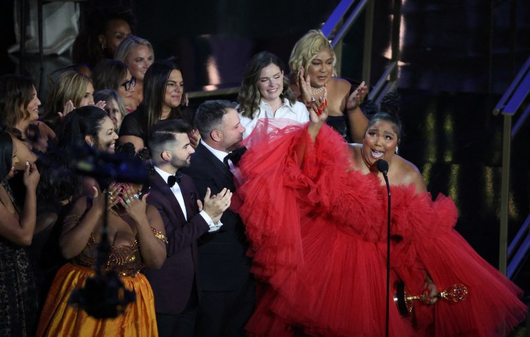 Lizzo and other cast members celebrate as she accepts the award for Outstanding Competition Program "Lizzo's Beware of the Big Grrrls" at the 74th Primetime Emmy Awards held at the Microsoft Theater in Los Angeles, U.S., September 12, 2022. REUTERS/Mario Anzuoni TPX PICTURES OF THE DAY