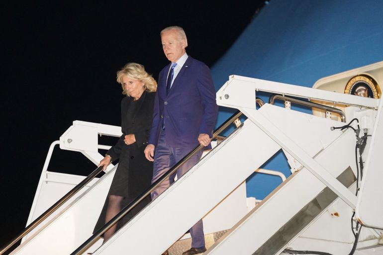 U.S. President Joe Biden and first lady Jill Biden step from Air Force One upon arrival at Stansted Airport to attend Monday’s funeral of Britain's Queen Elizabeth in London, Britain, September 17, 2022.
