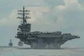 The USS Ronald Reagan Nimitz-class aircraft carrier in the Philippine sea.