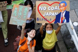 Young people take part in a global climate protest march in Omotesando district in Tokyo, Japan on Friday. [Issei Kato/Reuters]