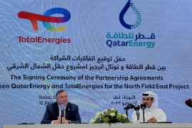 CEO of TotalEnergies, Patrick Pouyanne, Qatar&#39;s Energy Minister Saad Sherida al-Kaabi have signed a new investment deal on natural gas production [Imad Creidi/Reuters]