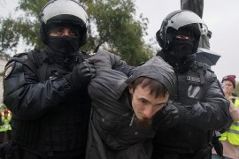 Russian police detain a protestor demonstrating in Moscow against President Vladimir Putin&#39;s partial mobilisation order [File: Reuters]