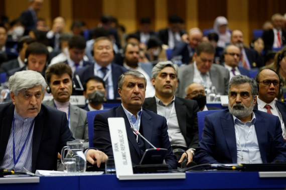 Iranian officials listening at the IAEA conference
