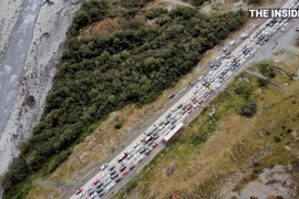 Drone footage shows long queues of vehicles on the way to exit Russia on its border with Georgia, in Verkhny Lars, Russia [The Insider/Handout via Reuters]