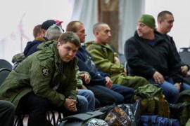 Russian reservists meet at a gathering point during the &#39;partial&#39; mobilisation of soldiers to fight in Ukraine [Reuters]