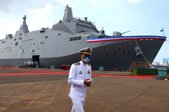 A Navy officer takes part in a delivery ceremony for the Navy's Yushan amphibious landing dock in Kaohsiung, Taiwan on September 30, 2022 [Ann Wang/Reuters]