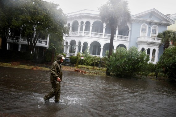 A resident walks in a flooded street in Charleston, South Carolina