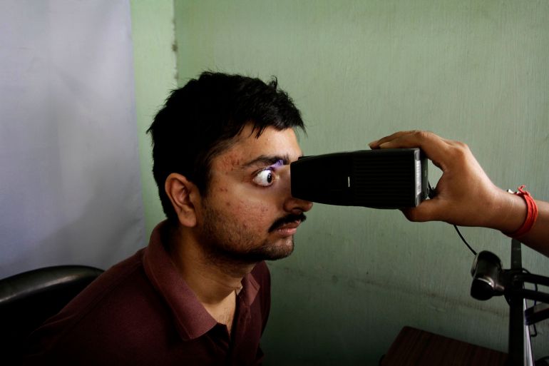 An Indian man gets his retina scanned as he enrolls for Aadhar, India's unique identification project in Kolkata, India. India's top court has ruled that the right to privacy is a fundamental right of every citizen of the country. The landmark verdict was in response to many petitions filed in courts questioning the validity of a government scheme to assign a unique biometric identity card to every individual. (AP Photo/Bikas Das, File)