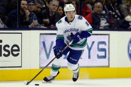 Vancouver Canucks ice hockey player Jake Virtanen (18), seen here in a 2018 game, was declared not guilty of rape by a jury in July, in a case that highlighted mounting concerns over Hockey Canada's handling of sexual assault allegations.(AP Photo/Tony Gutierrez)