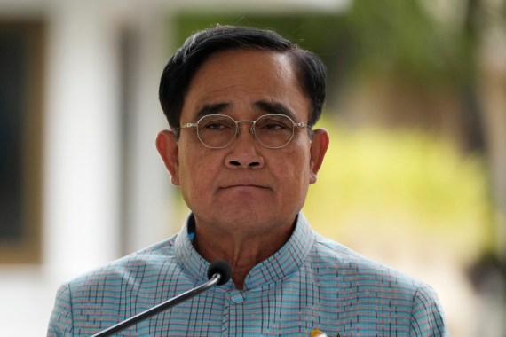 Portrait photo of the currently suspended Thai Prime Minister Prayuth Chan-ocha in a pale blue silk jacket