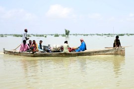 Already, 100,000 people have been displaced in efforts to keep the lake from overflowing [File: Pervez Masih/AP Photo]