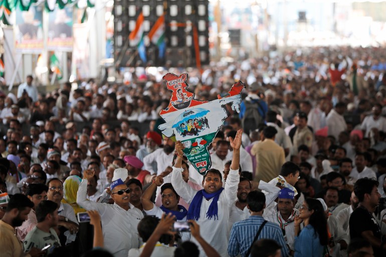 Congress party supporters shout anti-government slogans during a rally in New Delhi, India.