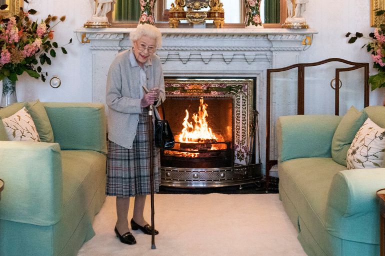 Britain's Queen Elizabeth II waits in the Drawing Room before receiving Liz Truss for an audience at Balmoral, in Scotland, Tuesday, Sept. 6, 2022