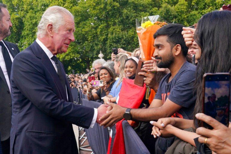 Britain's King Charles III greets well-wishers.