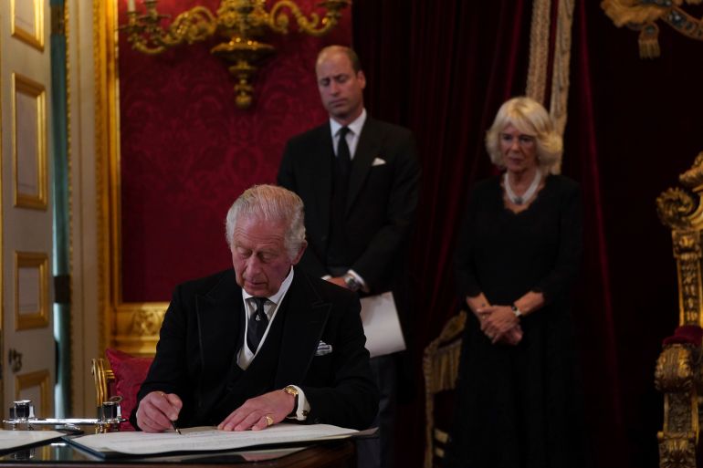 King Charles III signs an oath to uphold the security of the Church in Scotland during the Accession Council at St James's Palace