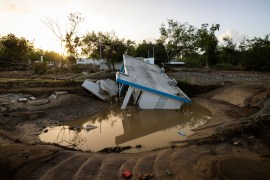 A view of a house that was washed away by Hurricane Fiona at Villa Esperanza in Salinas, Puerto Rico, September 21. [Alejandro Granadillo/AP Photo]