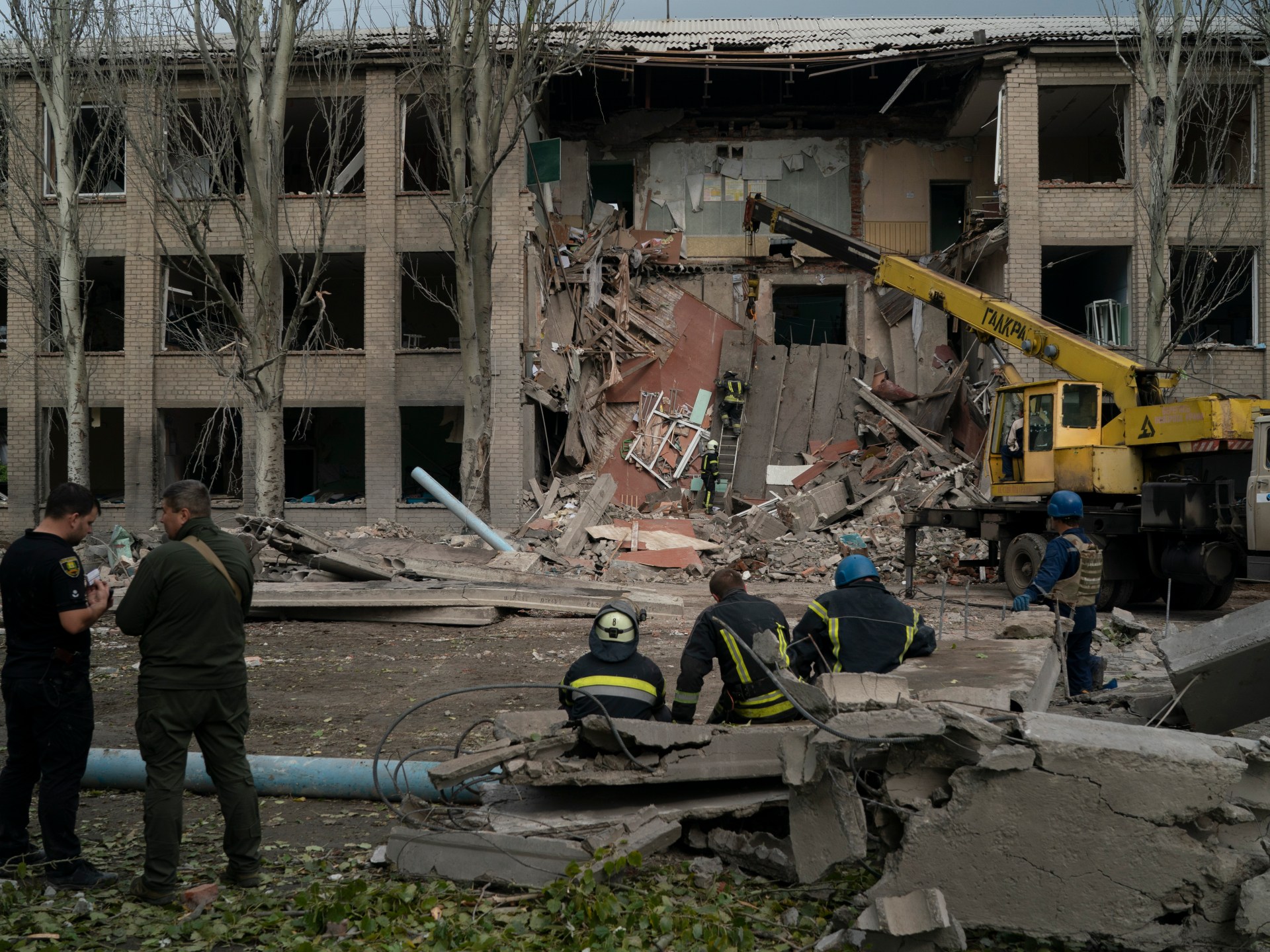 Photos: Alleged Russian attack hits school in eastern Ukraine