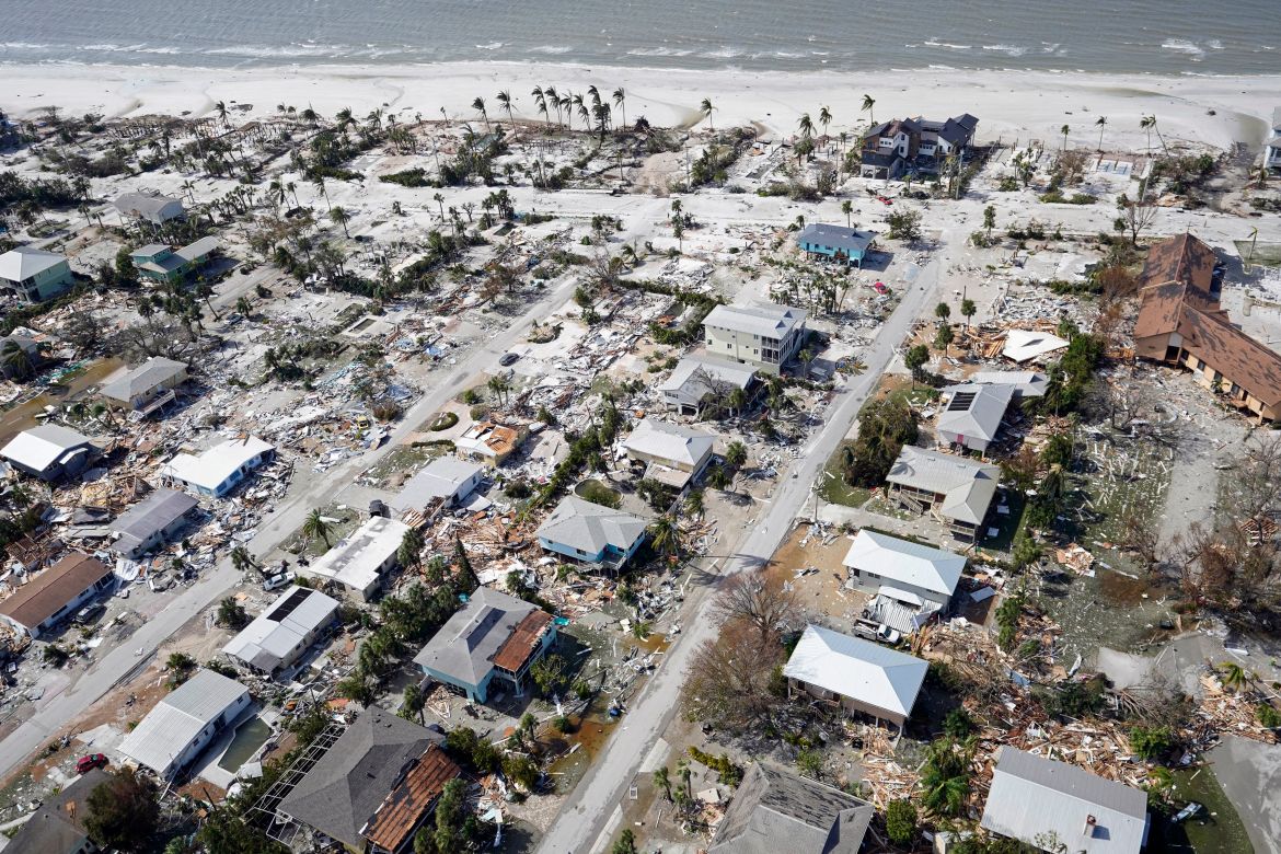 This aerial photo shows damaged homes and debris in the aftermath of Hurricane Ian