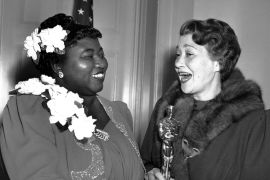 Hattie McDaniel, left, was given the Motion Picture Academy award for the best performance of an actress in a supporting role in 1939 for her work as "Mammy" in the film version of "Gone With the Wind" on Feb. 29, 1940 in Los Angeles, Calif. The presentation of the award was given by actress Fay Bainter, right. (AP Photo)