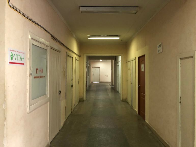 A photo of a corridor along a hospital.