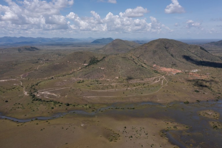 Drone shot of the Serra do Atola mountain with an illegal mining camp