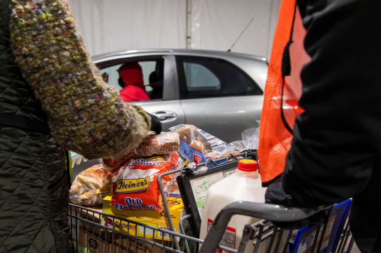 People receive donations at a food pantry in Columbus, Ohio, US