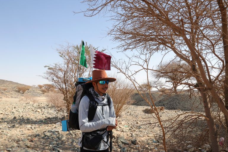 Saudi trekker Abdullah Alsulmi crosses a desert area near al-Khasrah area, some 350Km west of Riyadh.