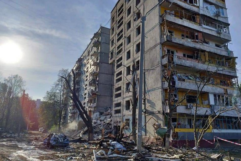 This picture shows a residential building damaged after a strike in Zaporizhzhia.