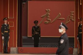 Security personnel stand guard at Zhongnanhai near Tiananmen Square
