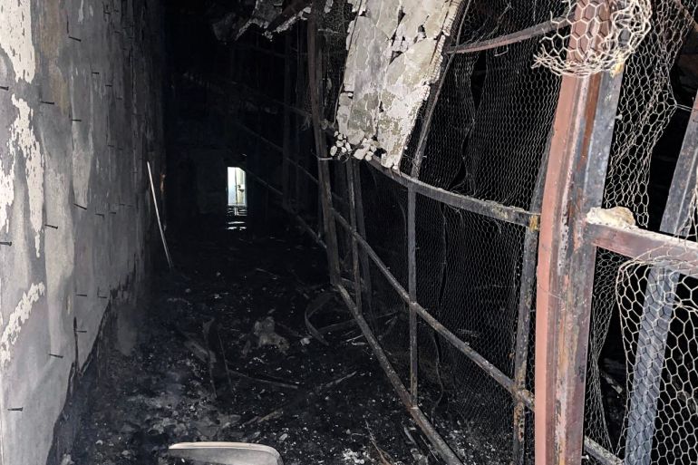 This image obtained from the Iranian news agency IRNA on October 16, 2022, shows damage caused by a fire inside the building of the Evin prison, in the northwest of the Iranian capital Tehran. - The unrest at the prison came as Iran has been rocked by weeks of protests since Mahsa Amini's death on September 16, three days after she was arrested by morality police in Tehran for allegedly violating the country's strict dress code for women.