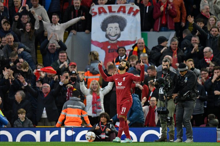 Liverpool's Mohamed Salah celebrates after scoring the opening goal against Manchester City.