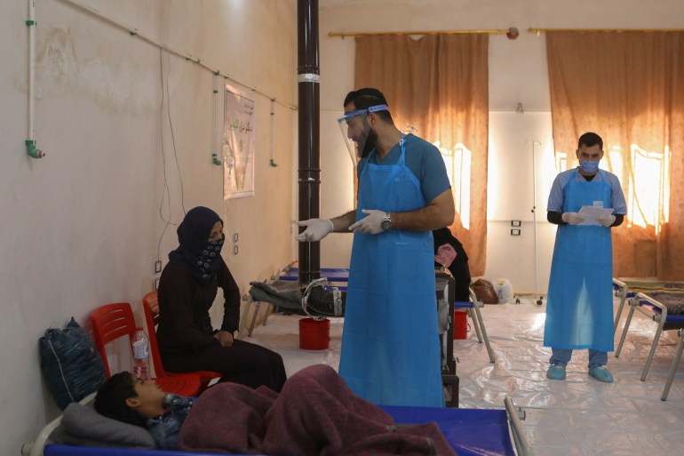 Patients receive treatment at a recently-opened medical center for Cholera cases in the Syrian town of Darkush, on the outskirts of the rebel-held northwestern province of Idlib, on October 22, 2022.