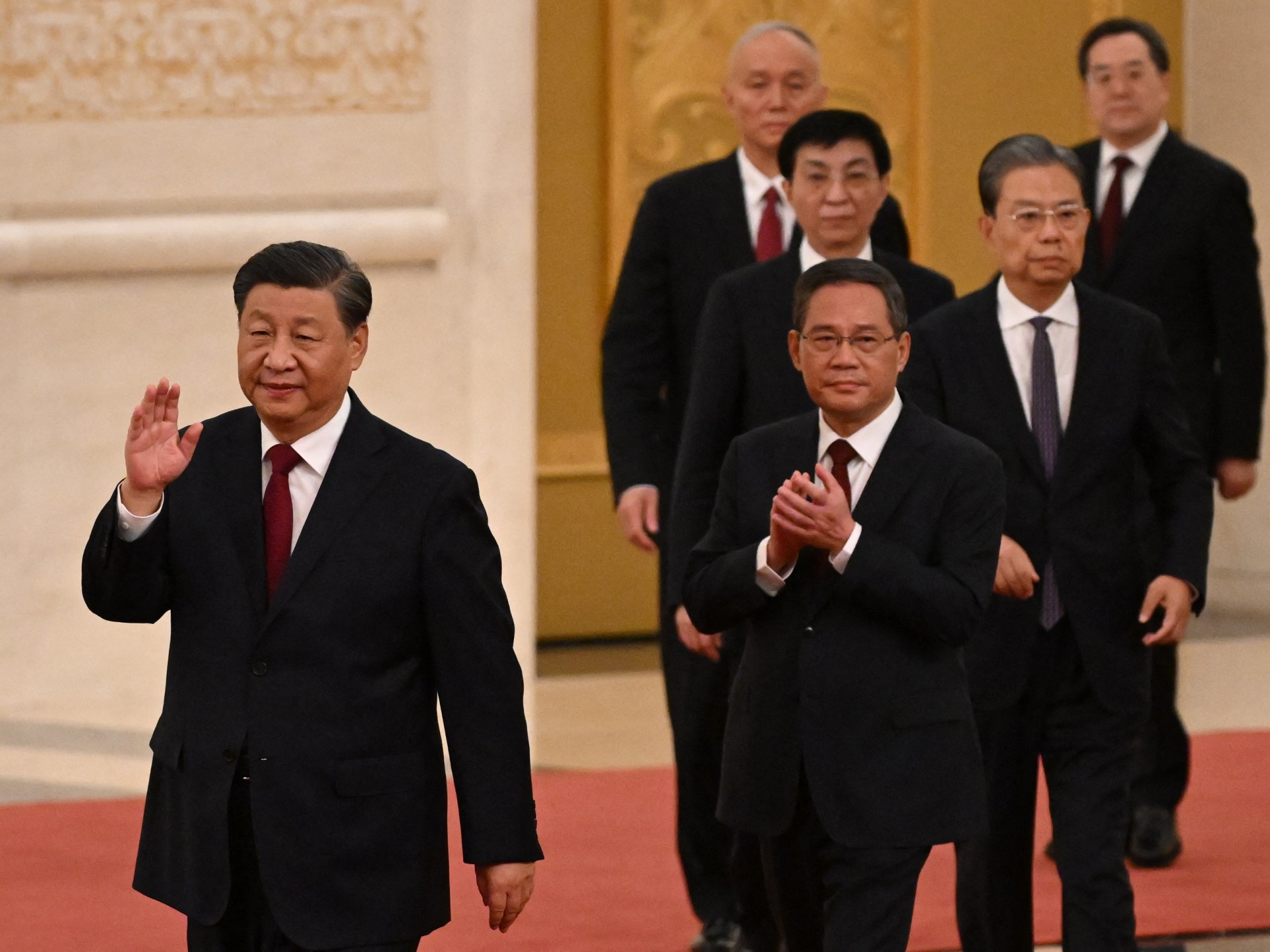 China’s Xi secures third term, stacks leadership team with allies