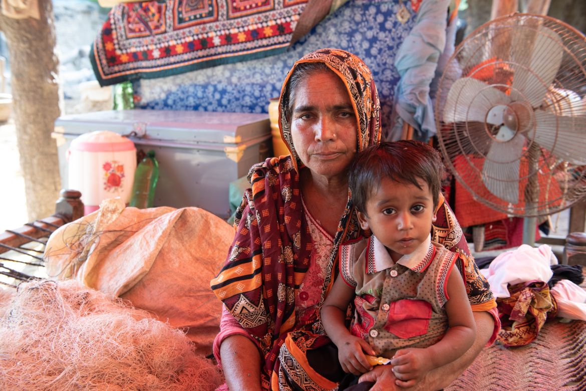 “My youngest son is constantly sick. We are using local remedies to treat him as there are no health facilities near us,” said Zeenat Bibi, holding her four-year-old son, Hussain.