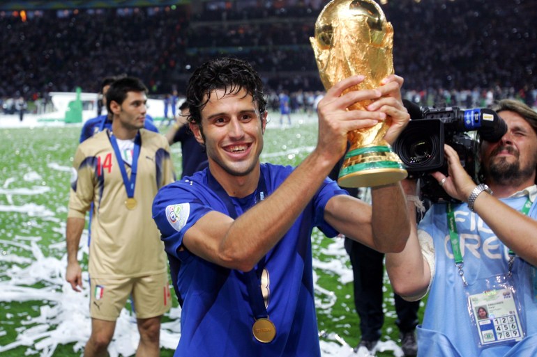Fabio Grosso of Italy celebrates with the World Cup