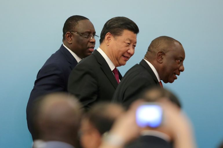 Chinese President Xi Jinping with South Africa's President Cyril Ramaphosa and Senegal's President Macky Sall.