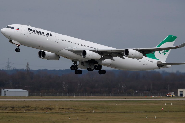 An Airbus A340-300 of Iranian airline Mahan Air takes off from Duesseldorf airport DUS, Germany.