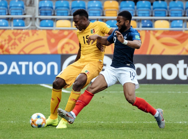 Football - Under-20 World Cup - Group E - Mali v France - Stadion GOSiR, Gdynia, Poland - May 31, 2019 France's Moussa Sylla in action with Mali's Abdoulaye Diaby.