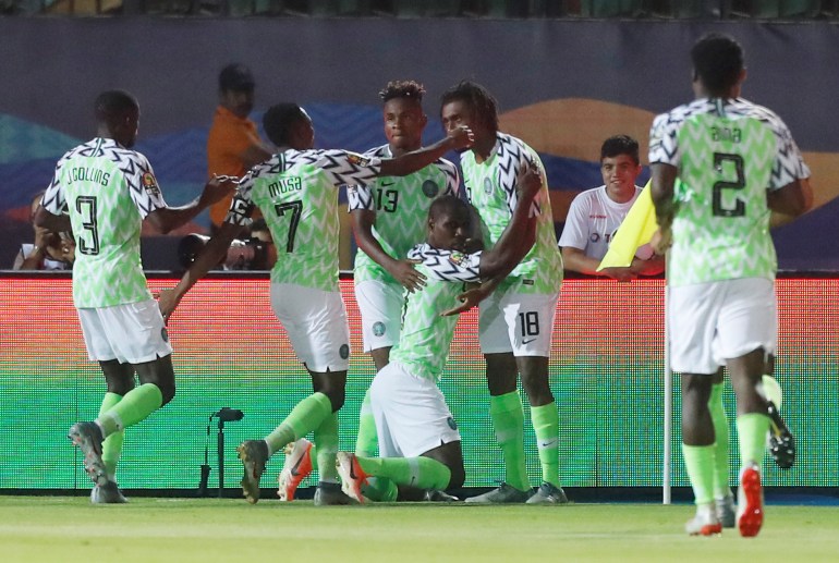 Nigeria's Odion Ighalo celebrates scoring his first goal with teammates 
