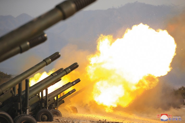 An artillery fire competition between the artillery units under the Korean People's Army Corps 7 and Corps 9 takes place at a training ground in North Korea, March 12, 2020
