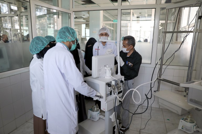 Nurses receive training on using ventilators recently provided by the World Health Organization at the intensive care ward of a hospital allocated for coronavirus patients in preparation for any possible spread of COVID in Sanaa
